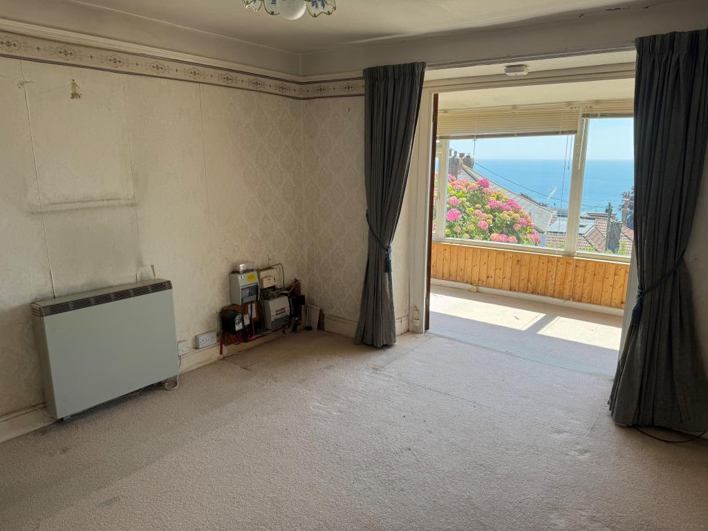 Lot: 147 - COTTAGE FOR IMPROVEMENT WITH SEA VIEWS - The Living Room